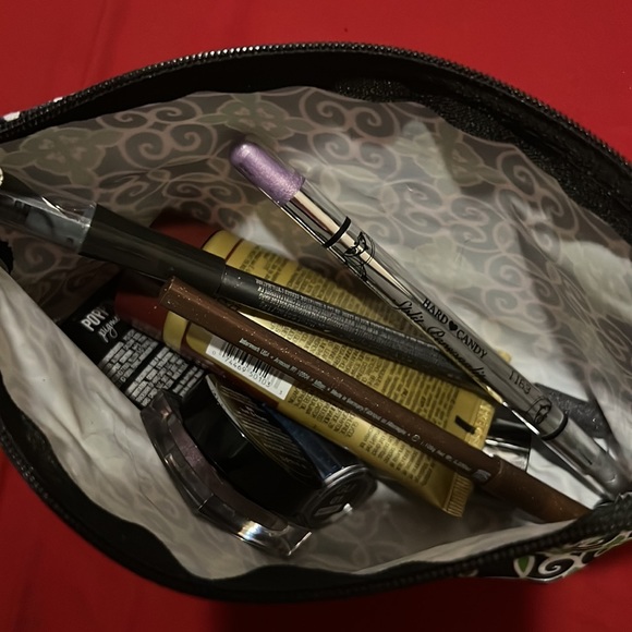 8 sample name brand makeup products inside! Like new!! - Picture 2 of 2